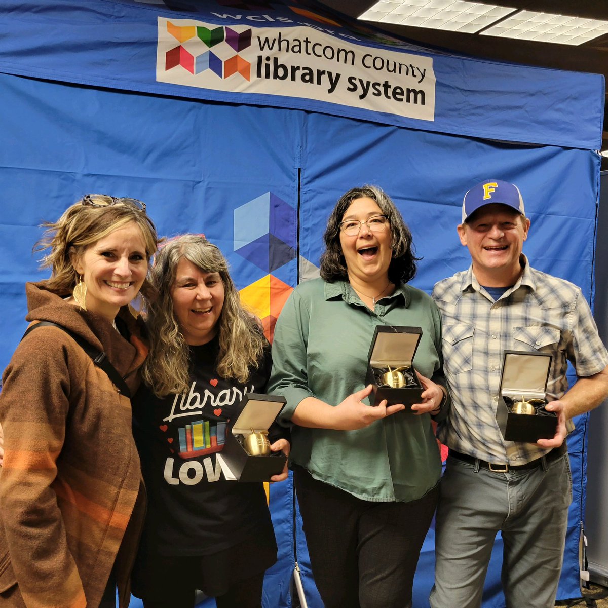 Celebrating 3 of @FerndaleSD_WA finest for receiving a Golden Apple Educator Award from @wclslibraries Congratulations to Tim Keigley, Sharon Lawler, and @AmyNylen. Such incredible advocates for our students, promoting reading and access to books for all students. #YouBelong