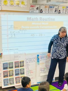 Mrs. Phillips class is engaged in a math routine. Students are engaged in subtracting with regrouping. #p3productivestruggle #pisdmathchat #pisdesmath #ThisisLFSmith