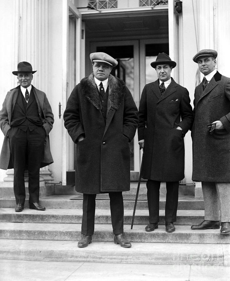 historyinmemes's tweet photo. In 1921, the 26-year-old Babe Ruth made a dapper visit to the White House, and the occasion was captured in this photograph. At the time, Babe Ruth was one of the most prominent celebrities in America, especially during the 1920s. On December 7th, 1921, he paid a visit to President Harding in Washington.

A newspaper article from that day described the encounter, stating that when Babe Ruth was introduced to the President, President Harding greeted him warmly. As Babe Ruth exited the meeting, he wore a smile even broader than the ones he had after hitting his famous home runs.

During the 1921 season, Babe Ruth had achieved a remarkable feat by setting a new record for the most home runs in a single season, hitting a total of 59 home runs. This record surpassed his previous record of 54 homers from the 1920 season, which, in turn, had broken the previous record of 29 home runs set during Ruth's 1919 season. Babe Ruth's legacy as a legendary baseball player was firmly established during this era.