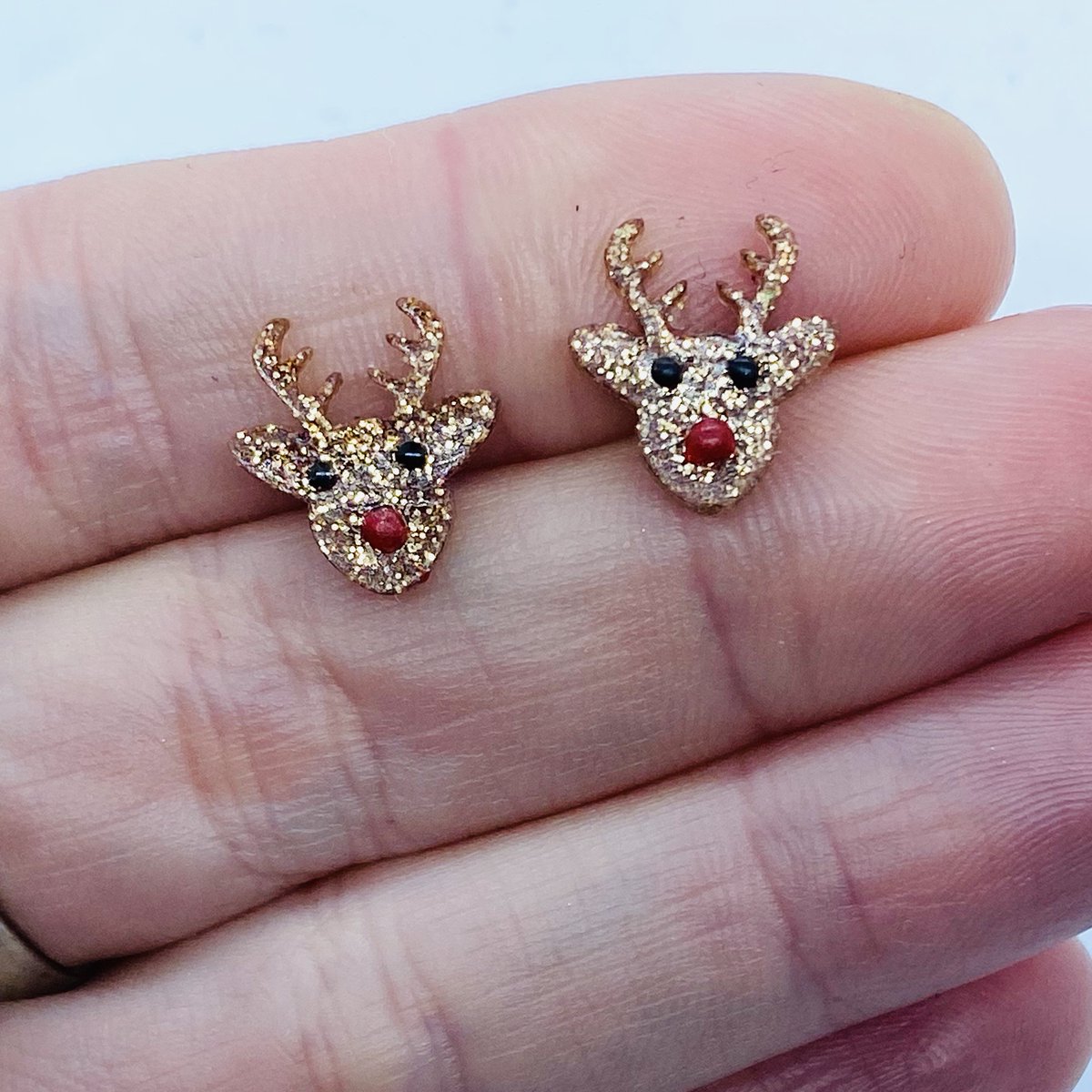 FreshBananas's tweet photo. These red nose reindeer earrings are made from resin and glitter pigment, giving a lovely shiny glossy finish perfect to add a bit of sparkle in the lead up to the festive period. The studs are made from 316 hypoallergenic stainless steel. 
 £8.79  inc p&amp;p
https://t.co/HVBMwa1MIs https://t.co/kCONmhiYiw