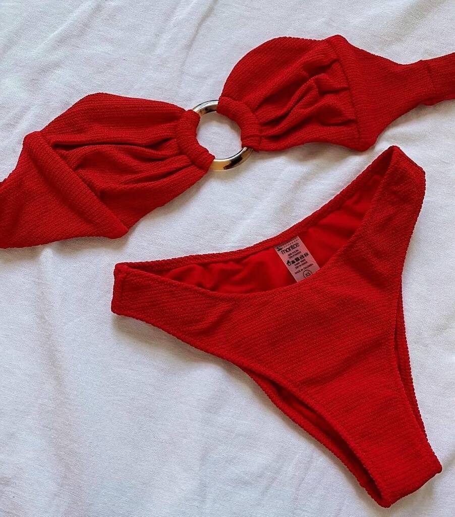 Elevate your beach style with a red-hot bandeau bikini featuring a chic tortoise twist🔥

.
.
#SwimwearFashion #BeachStyle #LuxuryVacation #HighEndDesign #BikiniGoals #DesignerSwimwear @montce_swim #swimwearworld