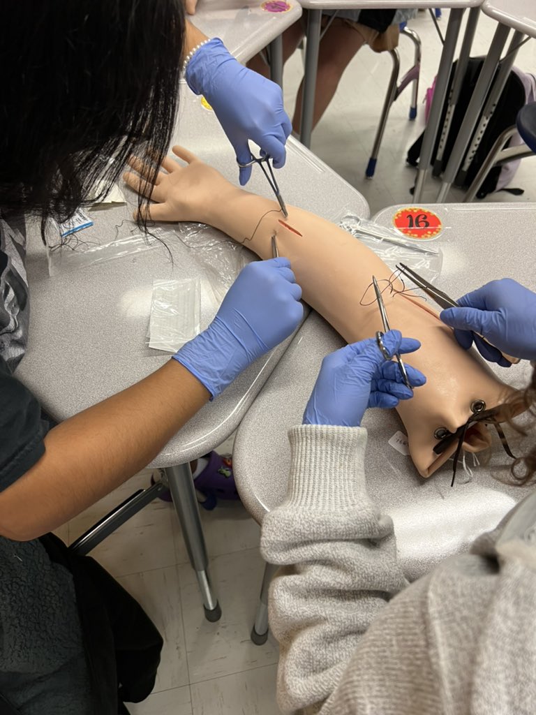 Medical Terminology students were practicing their suturing skills on the manikin’s arm. <a href="/McAllenISDCTE/">McAllen ISD CTE</a> <a href="/McHiPride/">Dr. Albert Canales</a> <a href="/McAllenISD/">McAllen ISD</a> <a href="/McHiCTE1/">Mirtha N. Jimenez</a> <a href="/hdperez5/">Herman Perez</a>