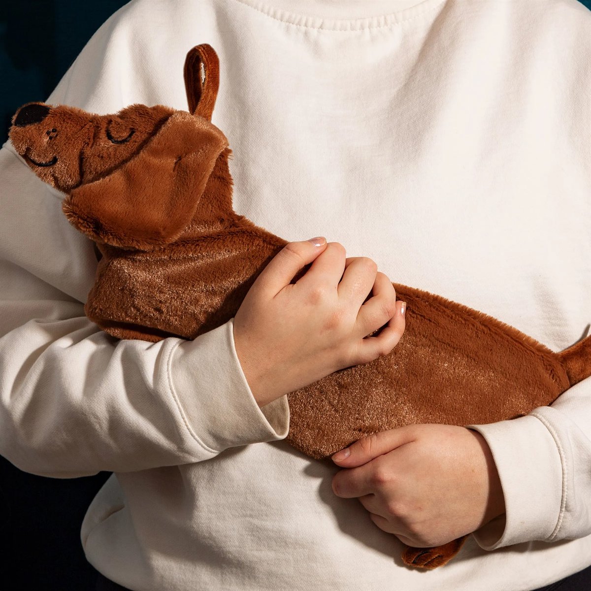 NEW IN - Cute and cuddly #sausagedog shaped hot water bottle to keep you toasty on winter nights. £20. Shop here: ⬇️ devotedtodachshunds.co.uk/product/sausag…