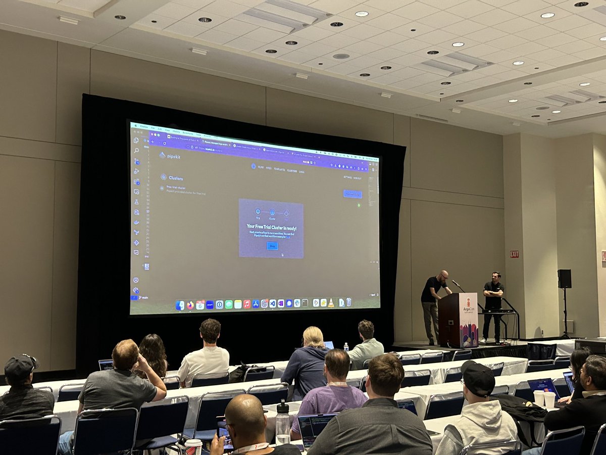 Our own Tim Collins and @loft_sh’s @LukasGentele presenting on how to use Argo and virtual clusters to scale to thousands of CI/CD pipelines today at #ArgoCon. Great job, guys! 🙌👏