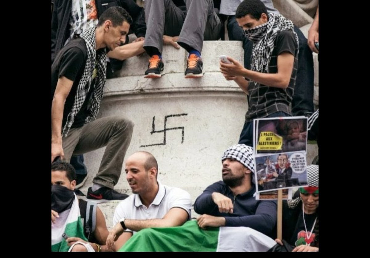 PatrioteWarrior's tweet photo. Allô #Adolf il y a tes enfants qui fouttent la merde a Paris https://t.co/PbT9XtUENM