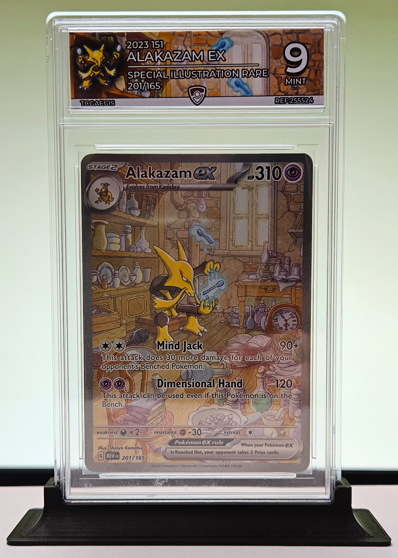 Samuleth_'s tweet photo. To those wondering what I have been up to (other than work/career etc)..

⭐️Me and a few others have started prototyping a slabbing/grading business for Pokémon TCG collectors with the aim to make it more accessible and affordable.

⭐️We understand not everyone wants to chase grades just for resale value, and many want to protect their collections, pack fresh, or old/played and sentimental in a slab with some awesome art work. 

👀We will eventually be offering grading (future) as well as "self slabbing kits"... more to come on that one! 

🔥Today our first batch of prototype slabs and labels were complete.. Here is a peak: