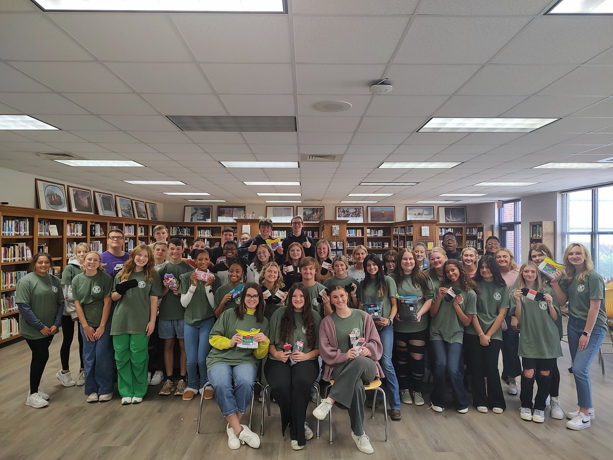 SHSTig3rPride's tweet photo. It's Key Club Week 2023. Today is Show your K.  The club is holding socks because they just finished a sock drive for the homeless. Key Club's motto is "Caring, Our Way of Life." #keyclubweek2023 #kiwanis #keyclubber https://t.co/nH0dS3YB2d