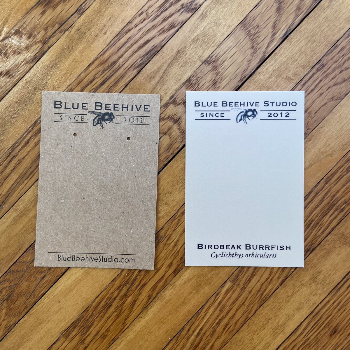 theBlueBeehive's tweet photo. I know it doesn’t look like much, but this is a personal milestone! I’ve wanted to put jewelry on cards that have the species name on it &amp; after years, finally there! New cards (right) will have the common &amp; Latin names. Want to see new pieces? They’ll be posted on Instagram 🐡 https://t.co/Gliq6xmNdM