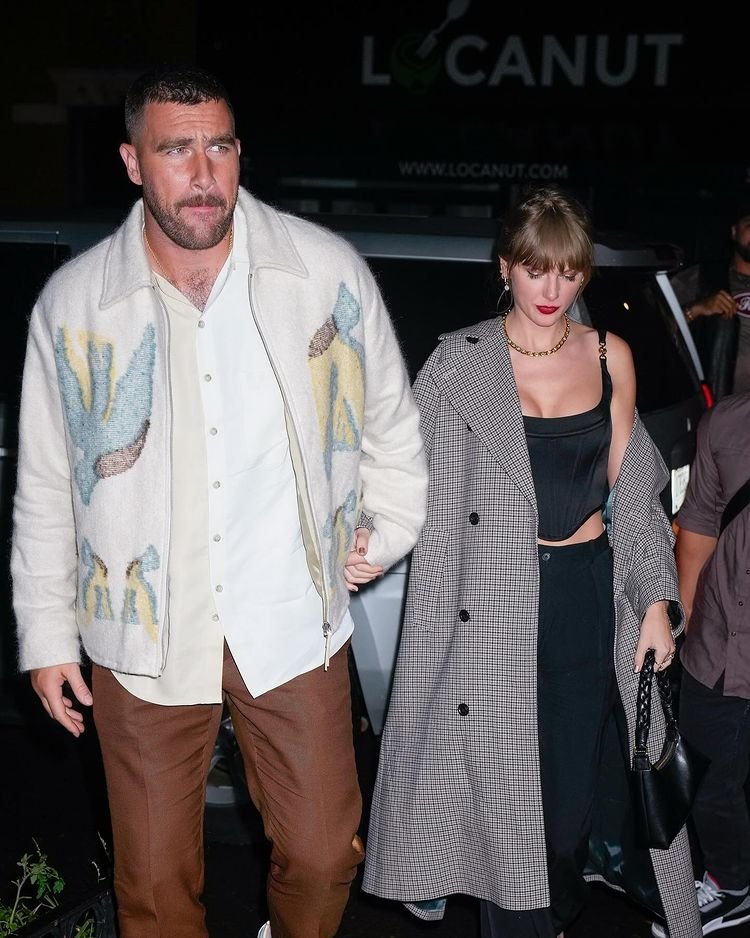 Evie_Magazine's tweet photo. Taylor Swift might be a self-proclaimed feminist, but it seems like she – and her female fans – are smitten with her new beau’s old-fashioned manners.

Who knew that something so simple as a man opening a car door and protectively guiding his date through a crowd would wow so many women online?

Instead of proclaiming Travis Kelce’s actions to be misogynistic and possessive, women overwhelmingly reacted with admiration for his manliness, gentlemanliness, and protectiveness. 

They saw Kelce’s actions as a physical manifestation of his respect for Swift and pride in being seen with her. 

This response is a telltale sign of a natural instinct that women feel they have had to bury for years.