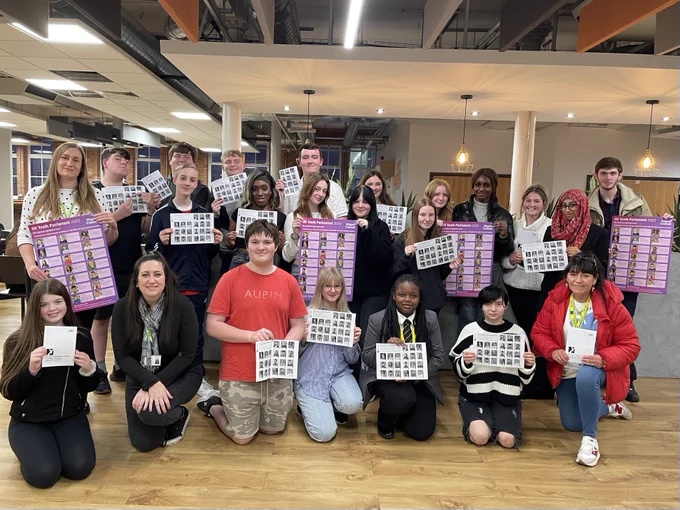 Young people and youth workers from the Youth Cabinet with their ballot papers and posters