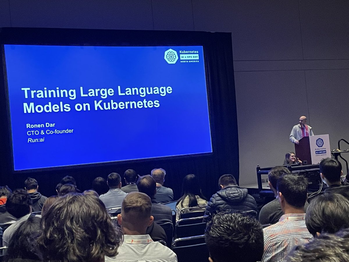 ha_joslyn's tweet photo. Standing room only for @ronen_dar 
of Run:ai at #kubecon #cloudnativecon co-located talk on training #LLMs on #Kubernetes. #AI needs dynamic compute but it’s hard to have GPU access when needed when GPU is shared manually. https://t.co/IKptsBWobi