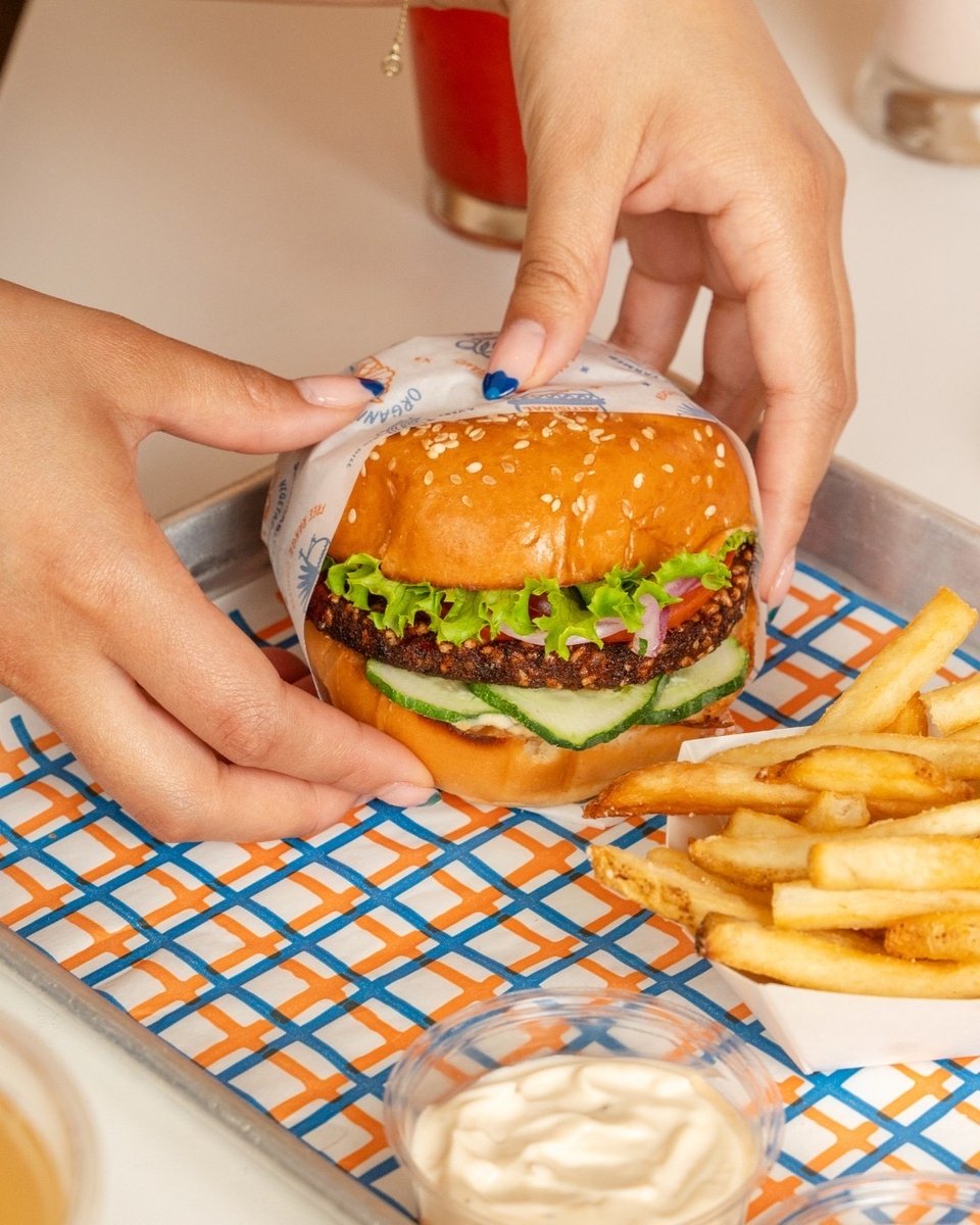 There's a burger for all your buds @superduperburgers. Pictured here is one of the best veggie burgers in the Bay, with a crispy organic patty, hummus, cucumbers, and (of course) secret sauce!