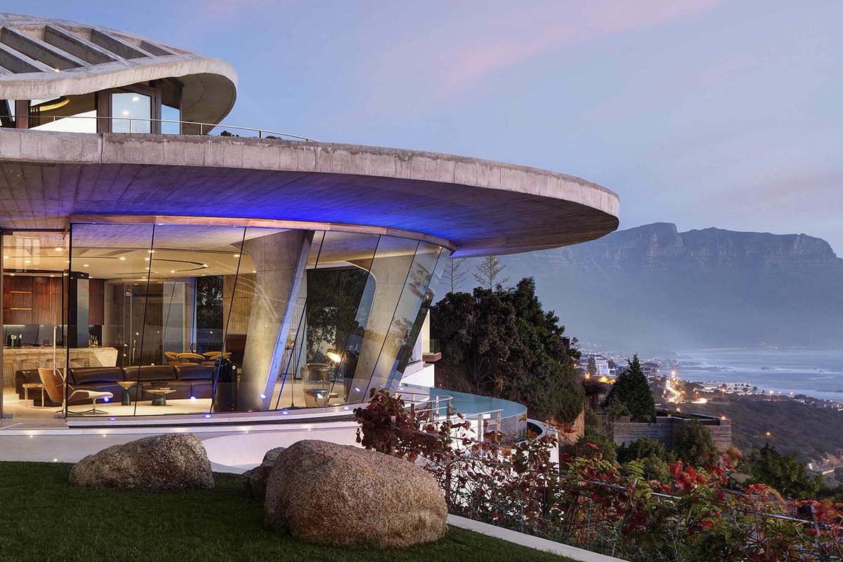Askash's tweet photo. You can stay at this luxurious Villa for up to R300 000 per night in Clifton, Cape Town. Introducing Iron Man House.

Quick facts about the property:

🤖 Storeys: 4
🤖 Bedrooms: 6
🤖 Bathrooms: 10
🤖 Parking bays: 8
🤖 Designed by: Peerutin Karol
🤖 Location: Nettleton Ridge, Clifton, #CapeTown

Amenities: spa, indoor heated swimming pool, jacuzzi, steam room and sauna, entertainment theatre, and 2 elevators.

The house is nicknamed ‘Iron Man House’ due to its mid-century modern #architecture. Depending on high or low season, a one night stay can cost you anywhere between R120 000 - R300 000.

What do you think of this home’s unique design? More pictures of the interior in the thread below.