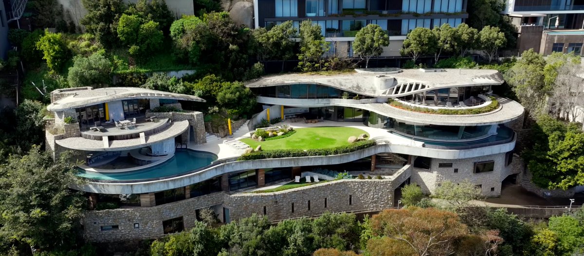 Askash's tweet photo. You can stay at this luxurious Villa for up to R300 000 per night in Clifton, Cape Town. Introducing Iron Man House.

Quick facts about the property:

🤖 Storeys: 4
🤖 Bedrooms: 6
🤖 Bathrooms: 10
🤖 Parking bays: 8
🤖 Designed by: Peerutin Karol
🤖 Location: Nettleton Ridge, Clifton, #CapeTown

Amenities: spa, indoor heated swimming pool, jacuzzi, steam room and sauna, entertainment theatre, and 2 elevators.

The house is nicknamed ‘Iron Man House’ due to its mid-century modern #architecture. Depending on high or low season, a one night stay can cost you anywhere between R120 000 - R300 000.

What do you think of this home’s unique design? More pictures of the interior in the thread below.