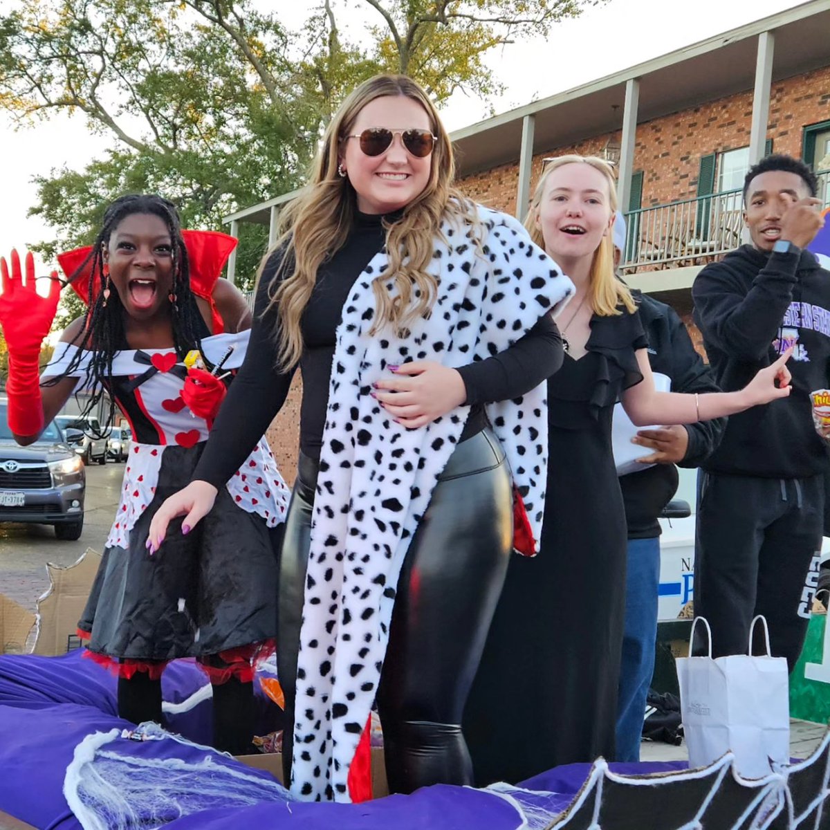 Sachirismom's tweet photo. Enjoyed spending Friday evening with my favorite Freshman for @NSULA Homecoming Parade!! Proud to be an alumni!  @Molly_Ringwalds were absolutely amazing!!🤘🏾💜🤍 #forkem #ForkEmDemons #nsuhomecoming2023 #NSULA #nsualumni  #sachiri #sachiris18 #hendersons #henderson3 https://t.co/UGYBuVoUzN