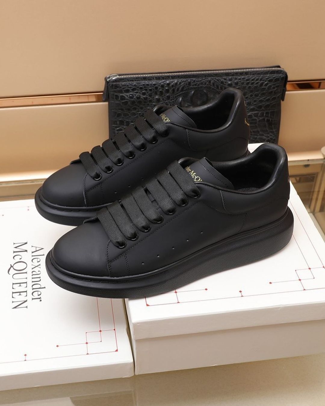 Alexander McQueen Price : Kshs 4000/= Color : Black and White