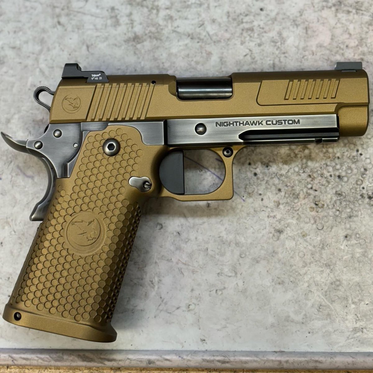 Check this out! Bad to the bone. 

Delegate Double Stack IOS (optic ready) in bronze and smoked nitride 🔥

#CustomPistol #HandFit #Custom1911 #DoubleStack #NighthawkCustom #Delegate #OneGunOneGunsmith #NighthawkCustomDelegate