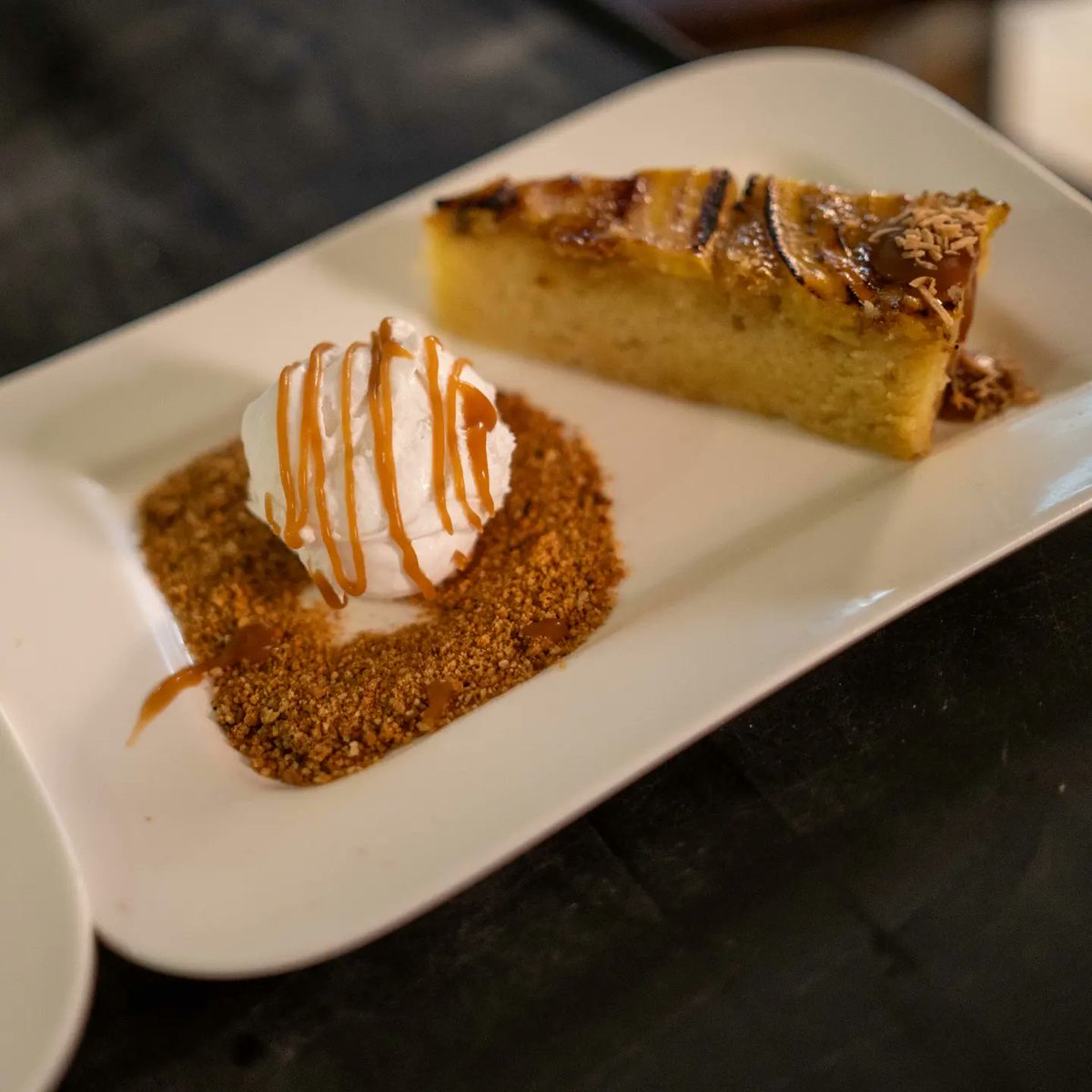 "Planoffee"

A Caribbean interpretation with  Lovelee Cakes Plantain &amp; Falernum Sponge Cake, Caramel, Toasted  Sweet Bread Crumble &amp; Churn’s Homemade Dairy-Free Coconut Ice Cream 
Paired with – 

"Uh Shot Uh Rum" (Hobby Class)
Doorly’s 14-Year-Old