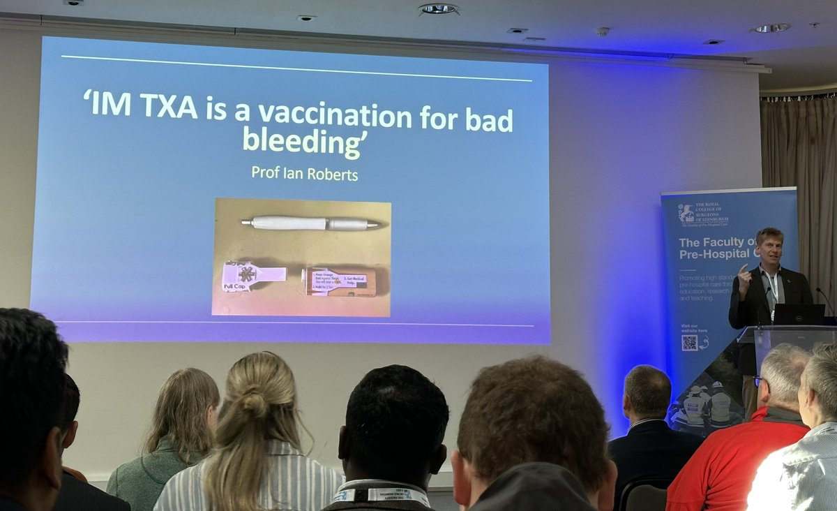 CrashCall's tweet photo. “IM TXA is a vaccination for bad bleeding” as we are shown a prototype TXA IM autoinjector device delivering 1g in 2.5ml. #FPHC2023 https://t.co/TARxNK3oEZ