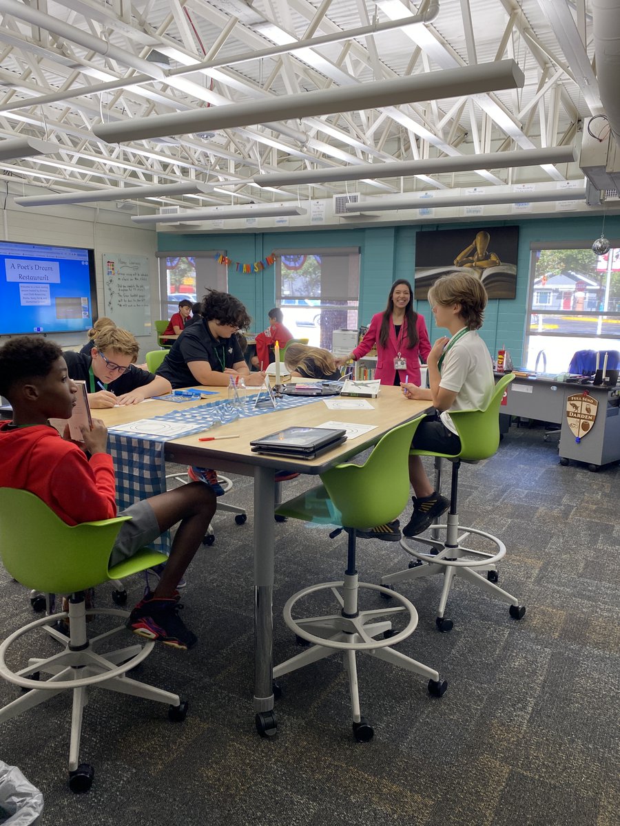7th grade English sampling novels in verse during our Book Tasting today! Trying to decided if my favorite part was students realizing novels in verse were actually "cool" or the flickering candlesticks 😆