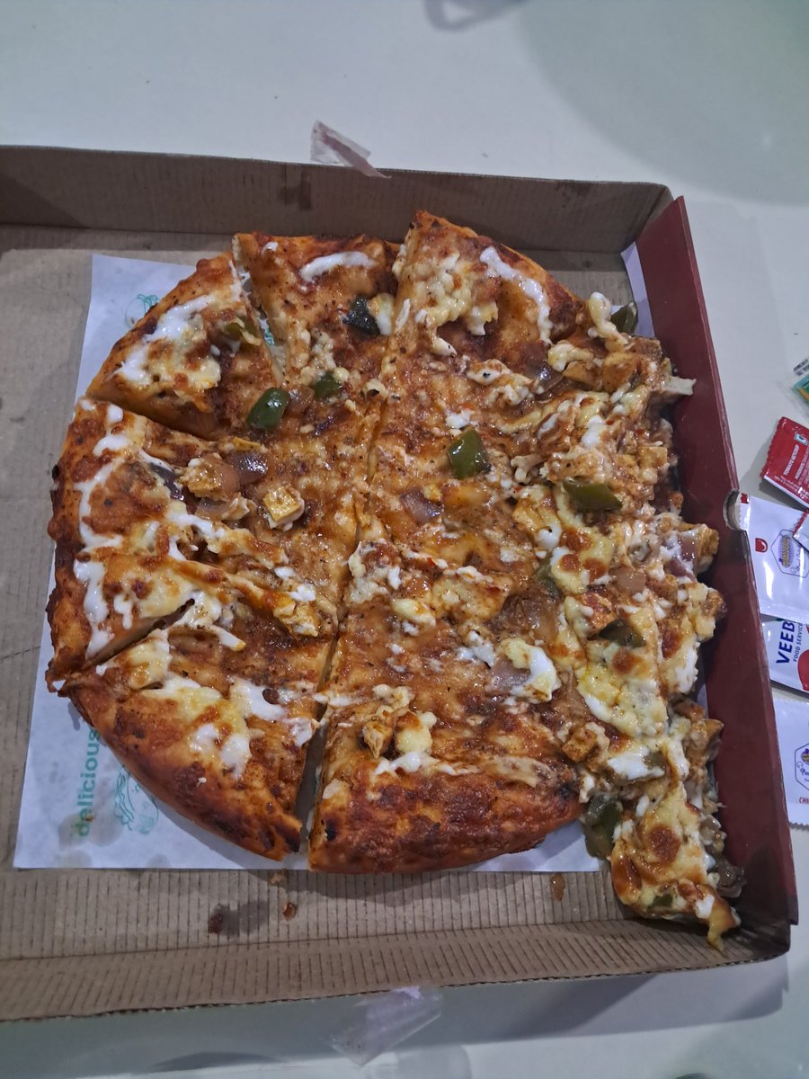 AnneshaP's tweet photo. @Swiggy this is unacceptable. 
Upon receiving my order I was shocked to find that the pizza I ordered was severely damaged during transit.  This not only affected the appearance of the pizza but also its taste and overall quality. I am hoping for a refund or atleast a reply. https://t.co/KheDCwVl6x