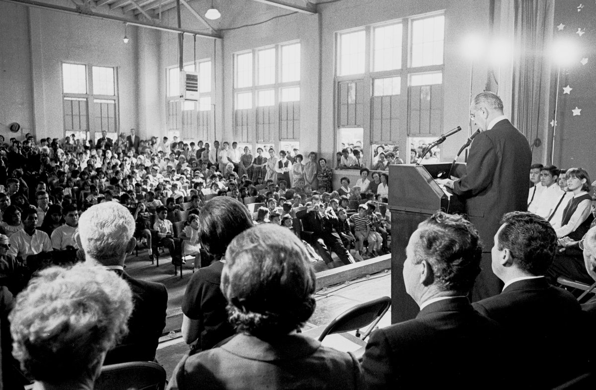 LBJLibrary's tweet photo. #OTD: Fifty-seven years ago, #LBJ went back to #Cotulla, #TX &amp; visited the Mexican-American school he once taught at while taking a break from his studies at the Southwest Texas State Teachers College (now @txst).

📷 Mike Geissinger | 11/07/1966 | Wellhausen School - #CotullaTX https://t.co/Hc0P8xRFM2