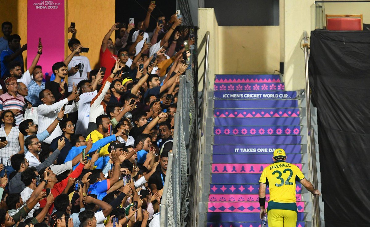 LoyalSachinFan's tweet photo. Glenn Maxwell at iconic Wankhede stadium stairs. Another iconic picture. #AUSvsAFG https://t.co/NhUXQzDor3