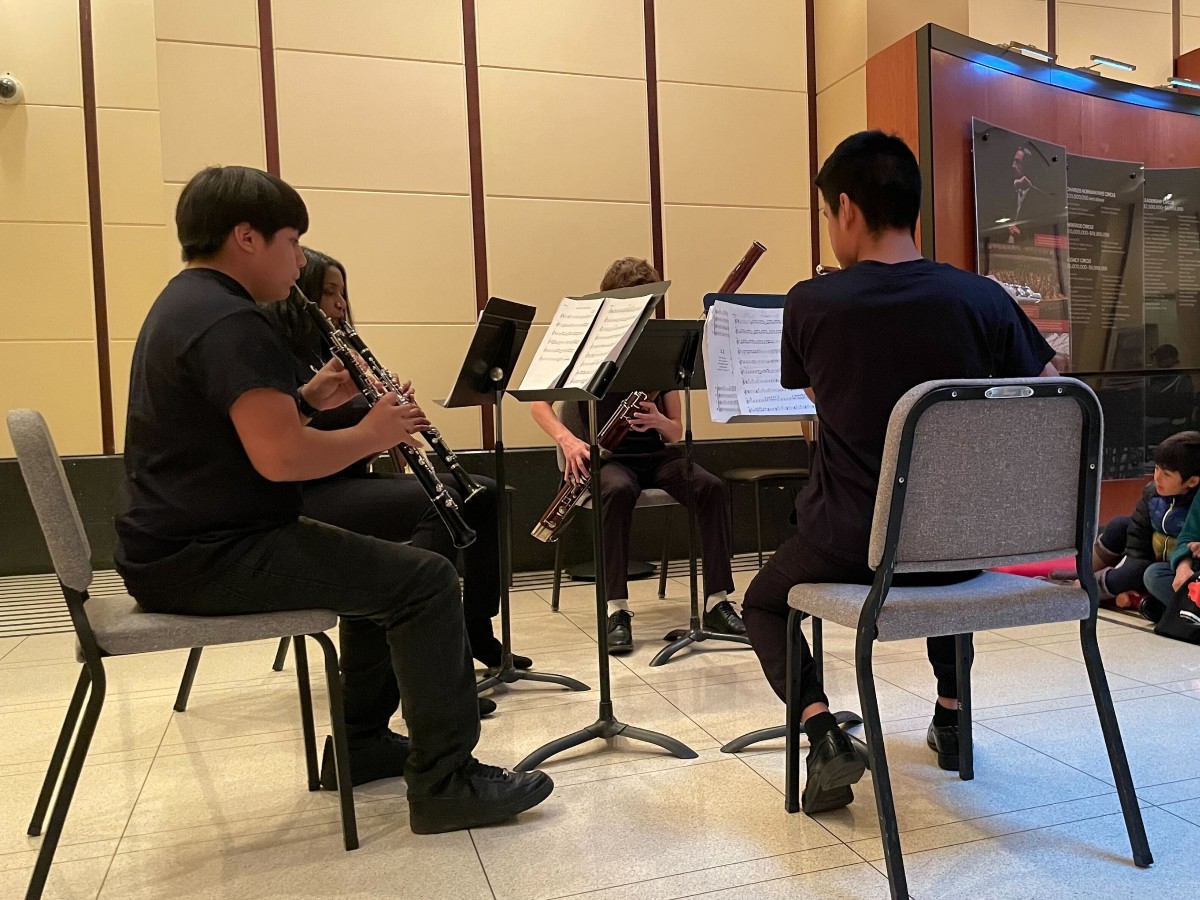 Bravo to our SLAM woodwinds who played at #SymphonyCenter on Saturday! The performance wasn't complete without showing some young students how woodwind instruments work. Congrats Kevin, Fernando, Morgan, and Hudson!
