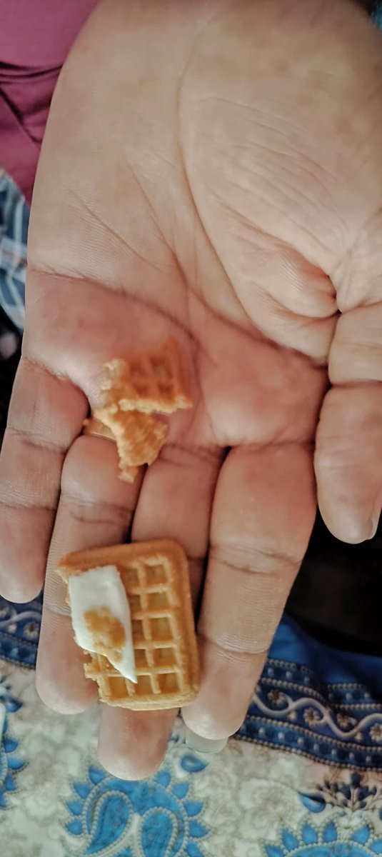 parthibang47's tweet photo. a hard piece of material got stuck in my tongue which was a plastic with a sharp edge (reference in pic added). what if a toddler had eaten that biscuit I can't even imagine that. How so careless? @MilkBikisIndia @BritanniaIndLtd https://t.co/k33rO5Wf5S