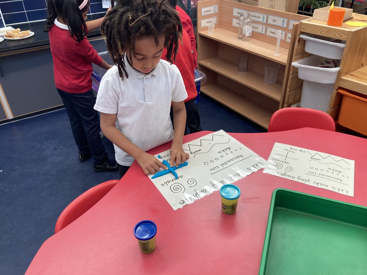 CP12022's tweet photo. What’s happening in P2 Play? Creating models of helicopters and spaceships. Finding fractions of shapes and magnet chat. Measuring purple water in bottles: asking questions about full, half full, less than and more than. And so much more…… https://t.co/REWgNggPO5