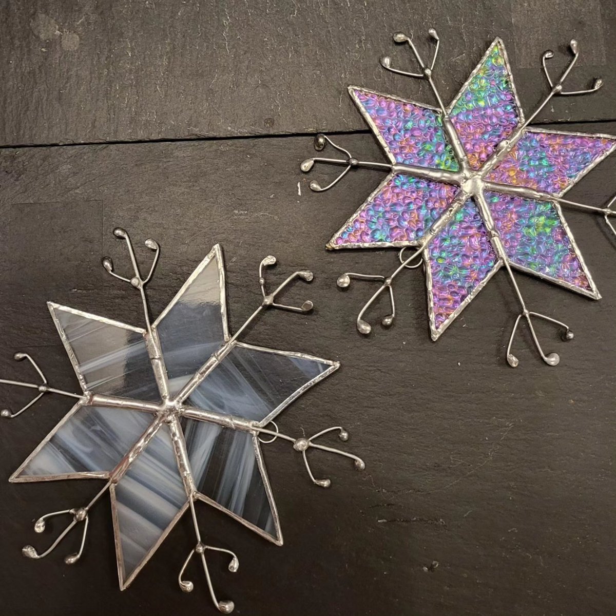 Some snowflakes ready for the Christmas Market at Sprowston 11th Nov 11:00 til 15:00 Cannerby Lane NR7 8NE.  Loads of craft stalls, pop over and see us for pressie inspiration  #madeinnorfolk #madebyme #stainedglass #snowflakes #Christmasgifts