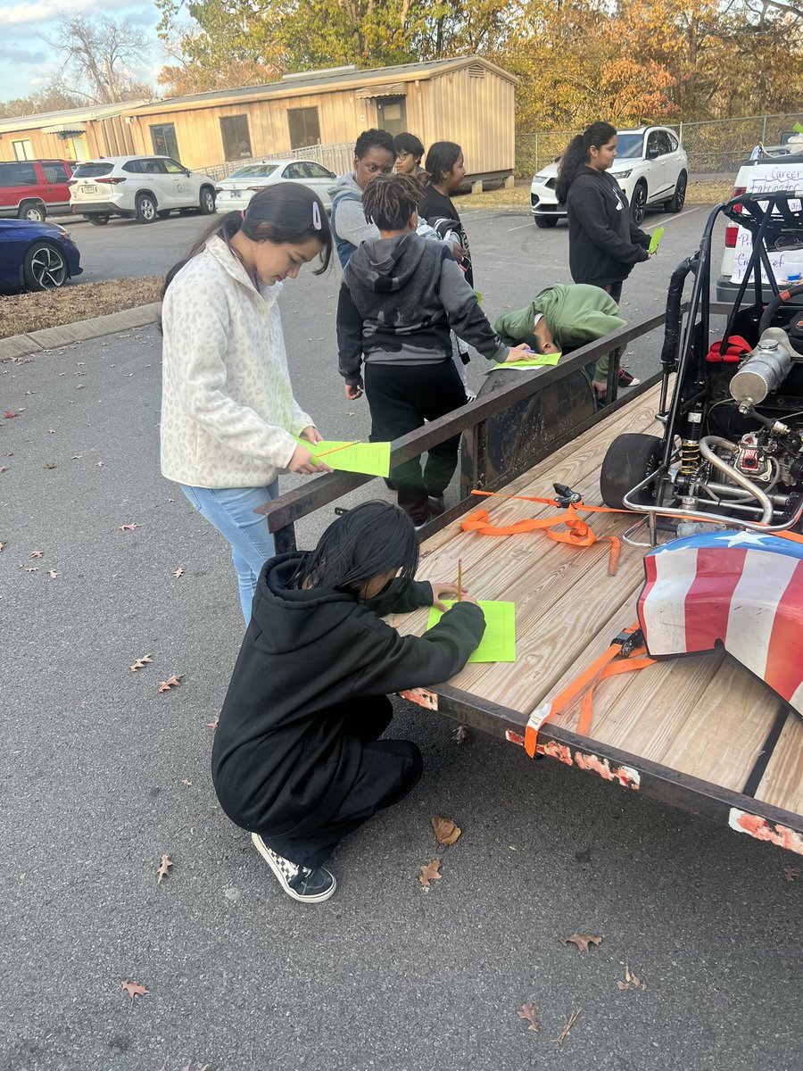 AMSLiteracy's tweet photo. During STEAM today, students learned about gas powered engines and careers in racing using a real NASCAR Youth Series car. They compared the gas powered engine to electric go karts using focused notes and had great discussions about their learning! @AntiochMSBears @MNPS_STEAM https://t.co/yflA9LdIG8