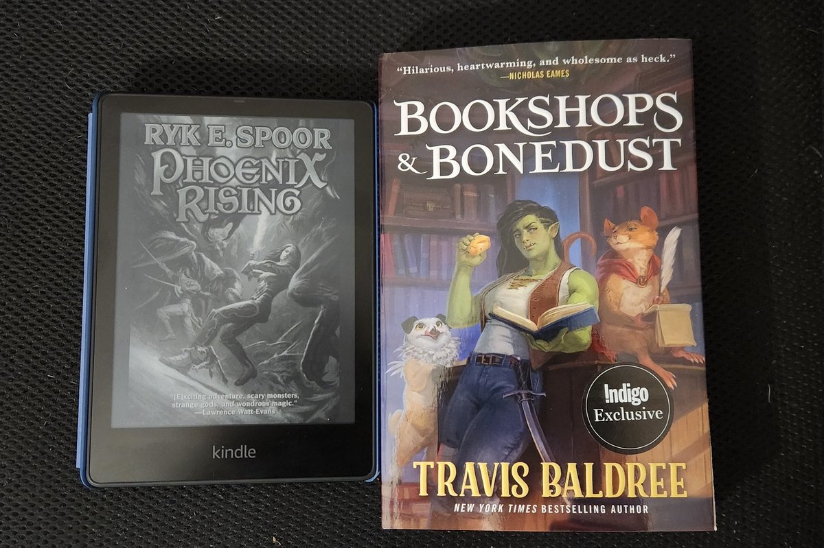 Something old, something new. Grabbed a copy of Phoenix Rising by Ryk E Spoor from the @BaenBooks #baenfreelibrary (feels like vintage 80s fantasy), and my preorder of Bookshops & Bonedust by @TravisBaldree arrived today (more cozy fantasy).
