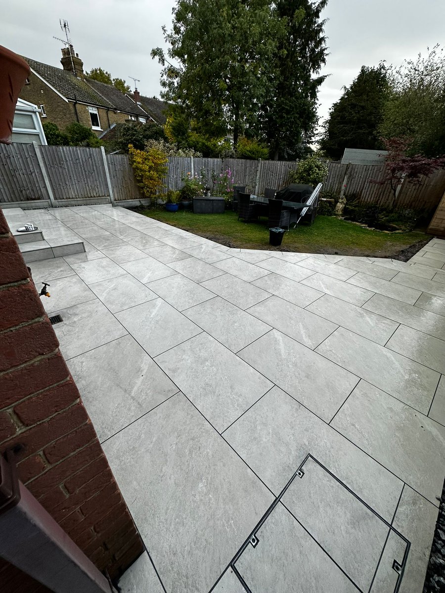 A new Himalayan white Porcelain Patio area with bull-nosed steps completed today .. please contact us if your thinking of transforming your garden area... bryan@marsomdriveways.com / 01268511503