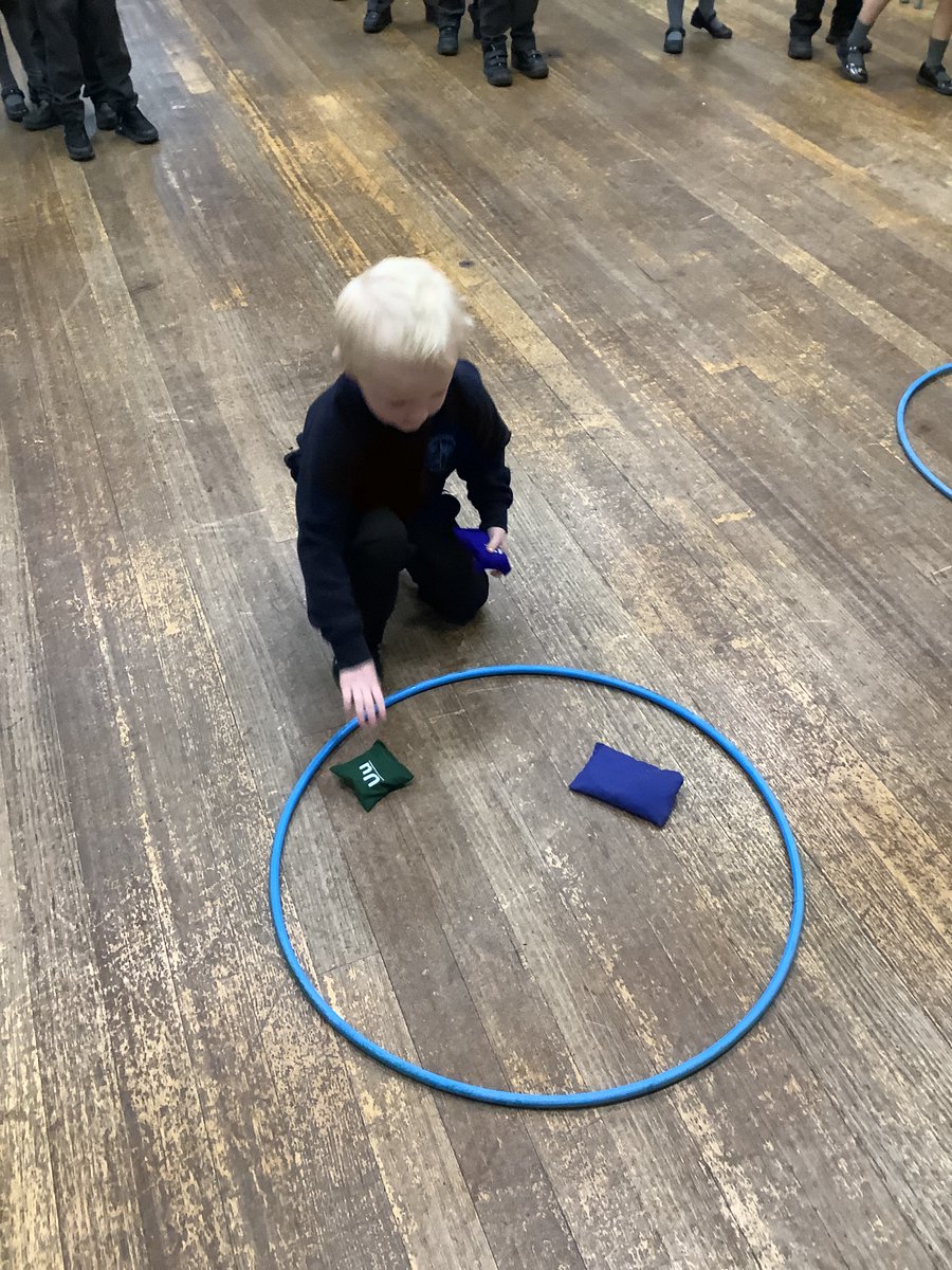 CaythorpeSchool's tweet photo. In maths children in #EYFS are learning to #subitise using beanbags and hoops. @WhiteRoseEd #Nurturinghearts #Inspiringminds https://t.co/PjhZIv3Dsa