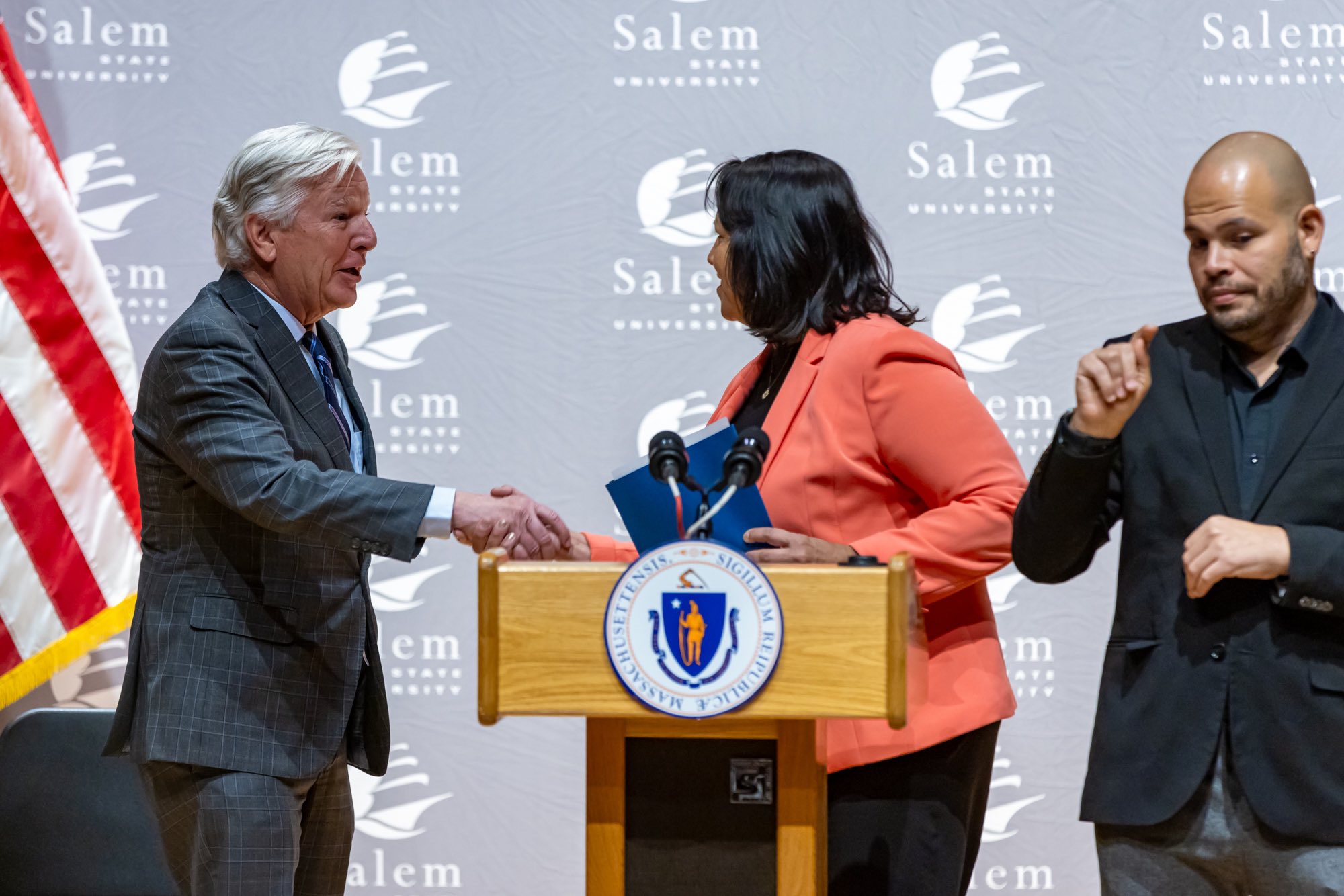 Lieutenant, Dovernor Driscoll shaking hands with UMass President Marty Meehan.