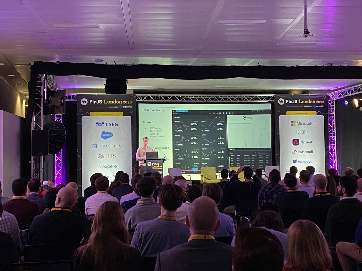 finjsio's tweet image. Developer Sebastian Moser @WeAreAdaptive is on the #FinJS stage now showcasing the various flavors of workflows that you can run through on Reactive Trader Workspaces, leveraging OpenFin integrations, and how to scale #UI Services with React-RxJS