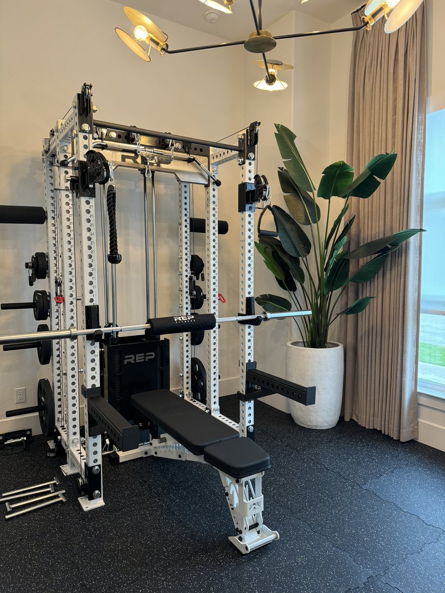 My wife and I just finished building out our home gym. 

Pretty happy with how it turned out.