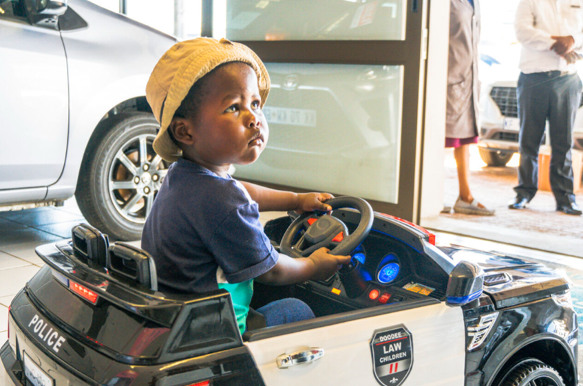 ReachForADream's tweet photo. 3-year-old Soyama from East London dreams of being a policeman & riding in a car. ๐ We teamed up with a local dealership to surprise him with his own ride-on police car! His joy is a reminder that happiness lies in simple things. ๐ #LittleDreamsBigJoy #FuturePoliceman #Hope https://t.co/GZGlGTCs5K