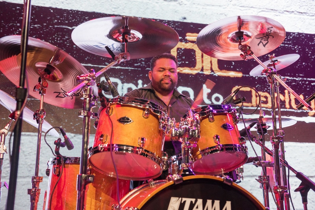 Rocking out on #NationalDrummerDay with our own Carlos Diggs! By day Carlos is our Director of Development. But when the lights go down, you can find him doing his thing with his band, Driven to Clarity. You never know if a new business opportunity will turn into a jam session!