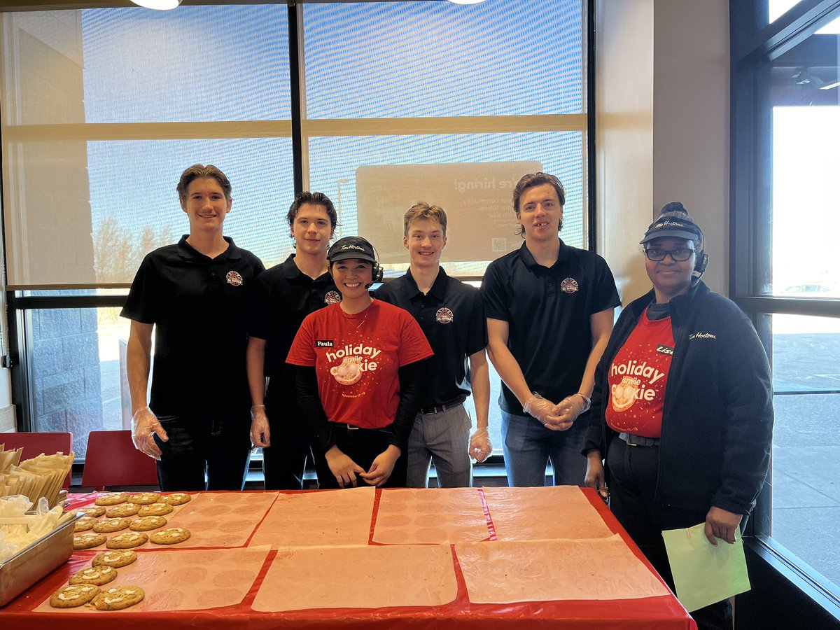OilCapsHockey's tweet photo. This morning at Tim Hortons, Oil Caps, Ty Plaisier, Luke Robson, Naton Miller, and Owen LaRocque are hard at work helping decorate smile cookies for #smilecookieweek 🍪

@mjhlhockey @timhortonswestman @virdentown https://t.co/SxJqNjPrm1