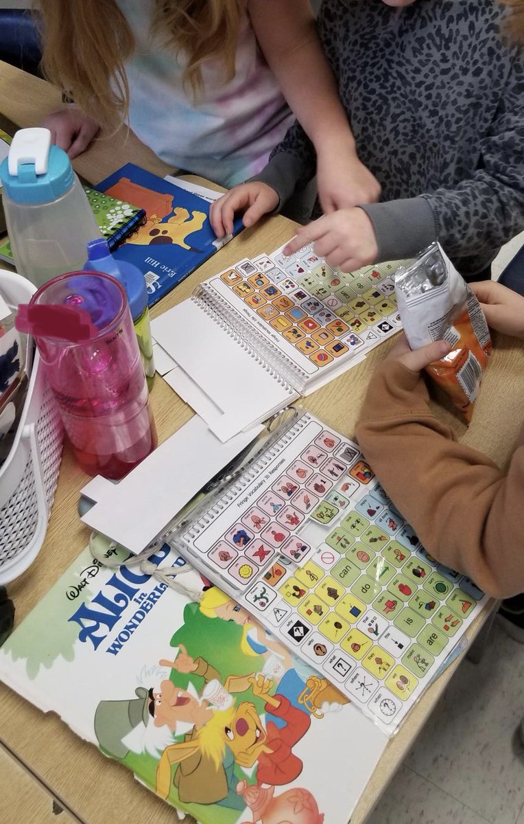 Students @Blenheimbobcat are modelling core vocabulary over books and snacks to their peer who uses symbols to communicate! #CommunicationForAll #AAC #CoreVocabulary