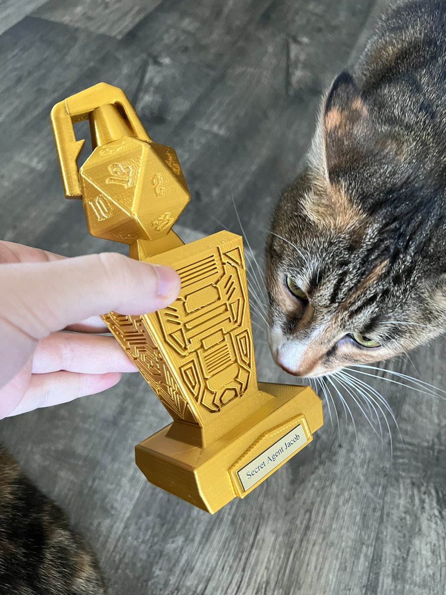 SecretAgentJ's tweet photo. Looks like the trophy I got from @TheVocalButcher for winning Cursed Halo Again (Again) gets Rinoa’s seal of approval https://t.co/eRQ3ZEpnJ3