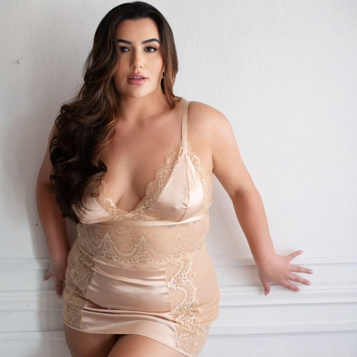 Feeling like a satin dream in the Curvy Laura Satin Babydoll Dress ✨ With superior stretch and lace details, this is your go-to silhouette for the holiday season. 💕 #LuxuryVibes #Satindress #CurvyConfidence #alwaysohlala