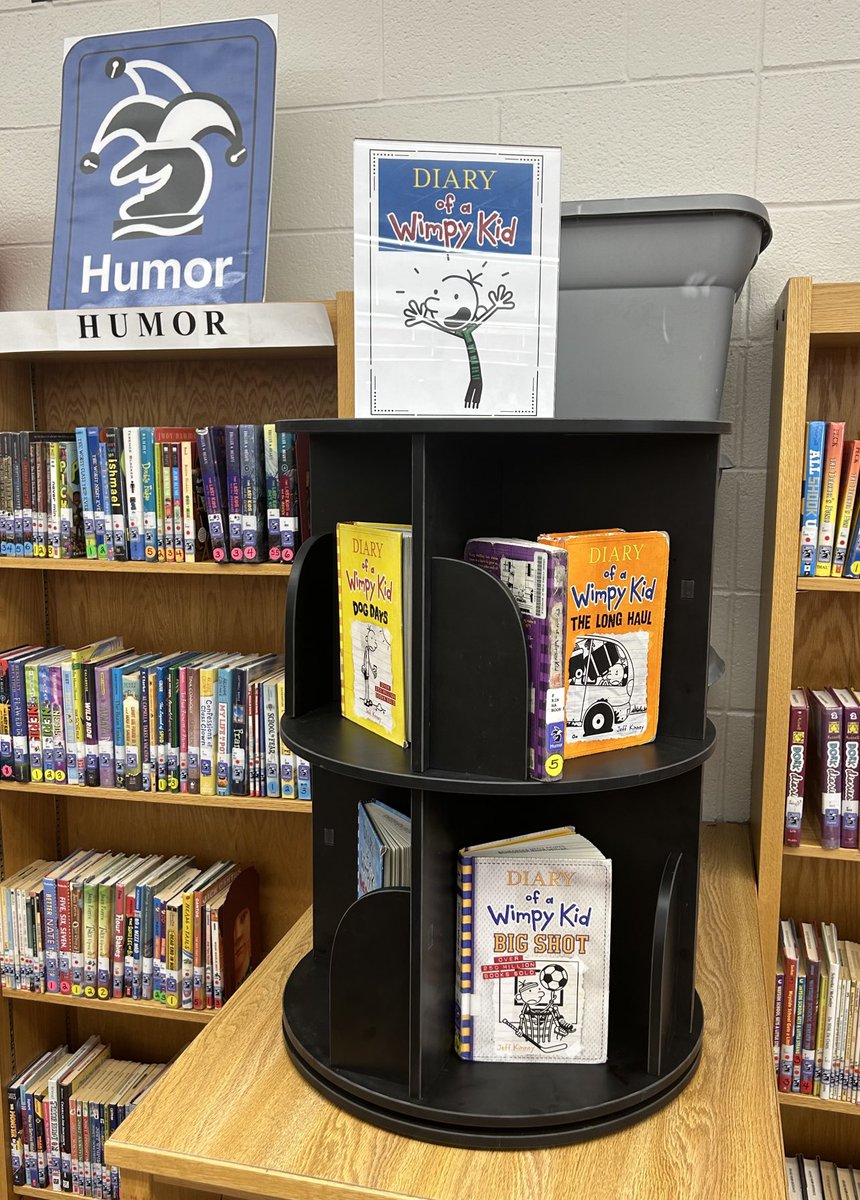 Raider_Library's tweet image. Have you checked out the new spinning shelf in the library ⁦@schroederms_gf⁩ yet? That’s where you’ll find the Wimpy Kid books from now on 😊