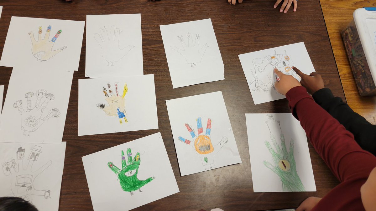 Kindergarten had some fun making Gyotaku prints with fish! And 4th grade got to make their own themed hand turkeys. Here they are checking out everyone's great drawings! <a href="/LyleDragons/">Lyle School</a>