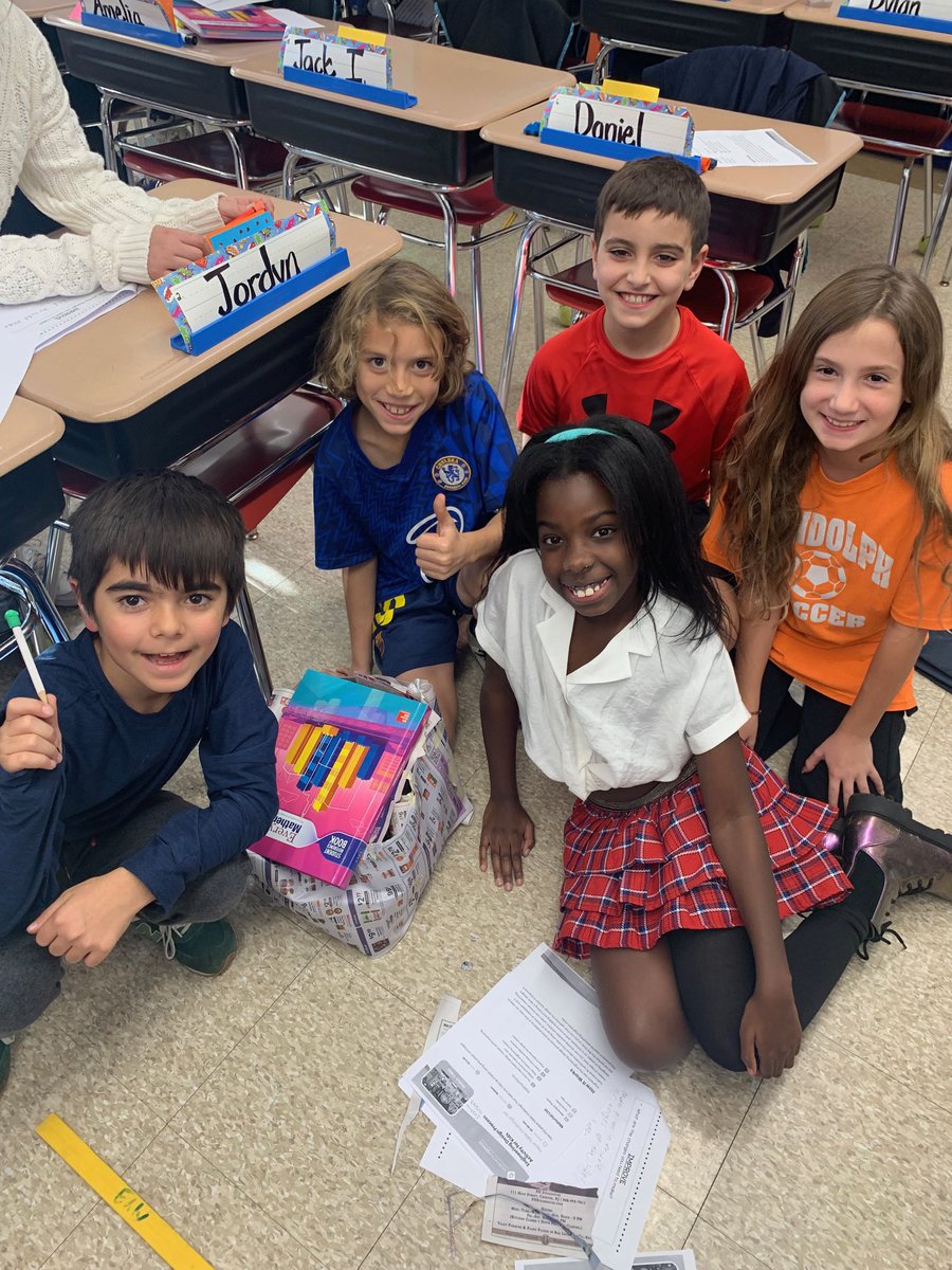 CenterGroveES's tweet image. Our future engineers in 3rd grade hard at work on the Paper Table Challenge. Their task was to hold up a book using only paper and tape. We’d say they were pretty successful!