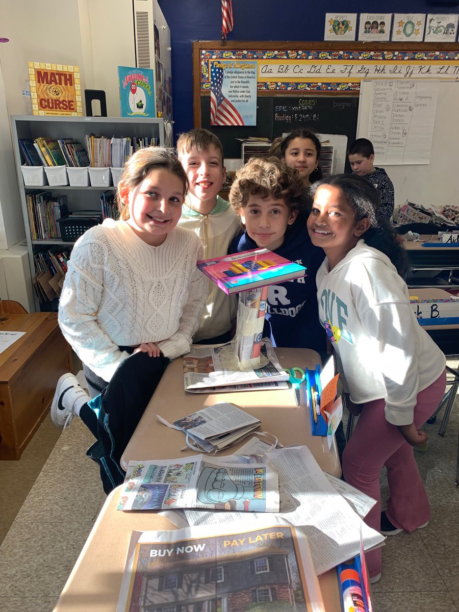 Our future engineers in 3rd grade hard at work on the Paper Table Challenge. Their task was to hold up a book using only paper and tape. We’d say they were pretty successful!