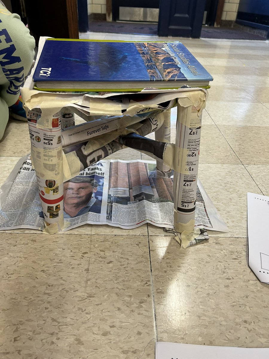 CenterGroveES's tweet image. Our future engineers in 3rd grade hard at work on the Paper Table Challenge. Their task was to hold up a book using only paper and tape. We’d say they were pretty successful!