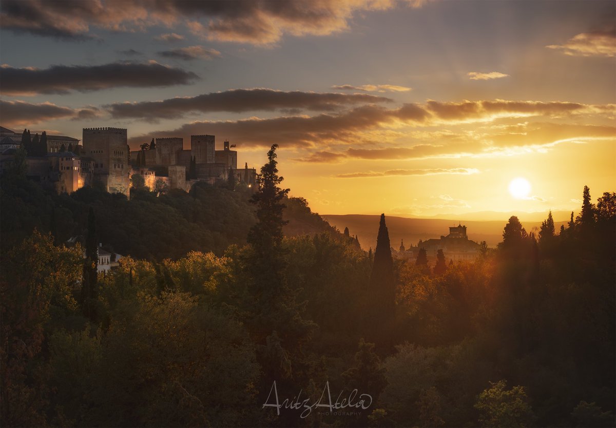“Alhambra during a golden autumn sunset”